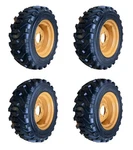 10-16.5 Trac Chief Usa Skid Steer Tires/wheels/rims For Case (6LUG)-8PLY. Fixed Price $1440.00.