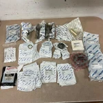 Lot Of Caterpillar E8000 Forklift Steering Parts, Bearings, Spacer, Link Nos. Fixed Price $599.99.