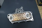 Oem Nissan Oil Cooler With Regulators For QD32 Engine 21305-54T02. Fixed Price $225.00.