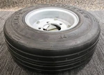 (qty 1) Taylor-dunn 13-734-40,SRIM,5-H,4X8, Mantoter Rib Tire And Wheel Assembly. Fixed Price $296.65.