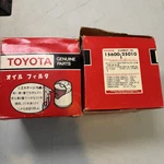 Two (2) Filters Genuine Parts Toyota Oil Assembly 15600-250101 Corolla. Fixed Price $29.99.