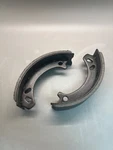 Taylor Dunn Brake Shoe Set Of 2 41-635-00. Fixed Price $85.00.