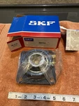 Skf F4B 107-RM Ball Bearing Flange Unit Square Bolts 1-7/16 Bore New Box. Fixed Price $49.99.