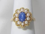 Vintage 14K Yellow Gold Linde Blue Star Sapphire Cabochon & Pearl Ring Size 5.75. Fixed Price $595.00.