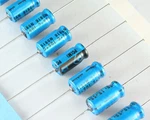 Lot Of Eight TPC1H100M Nichicon Capacitor 10UF 50V Aluminum. Fixed Price $26.00.